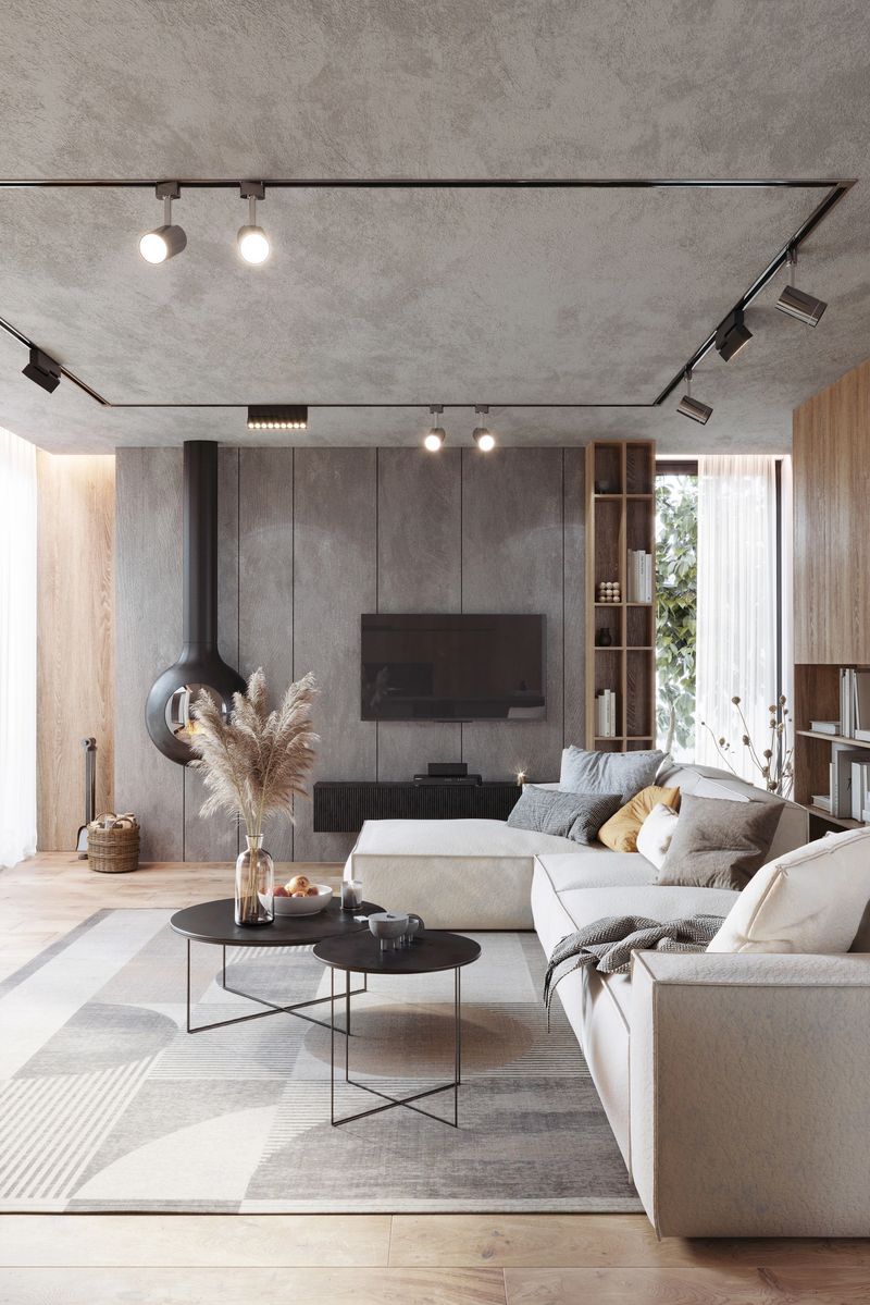 Living room with tv hanging on grey wall, white sofa and coffee table. 3d render image.