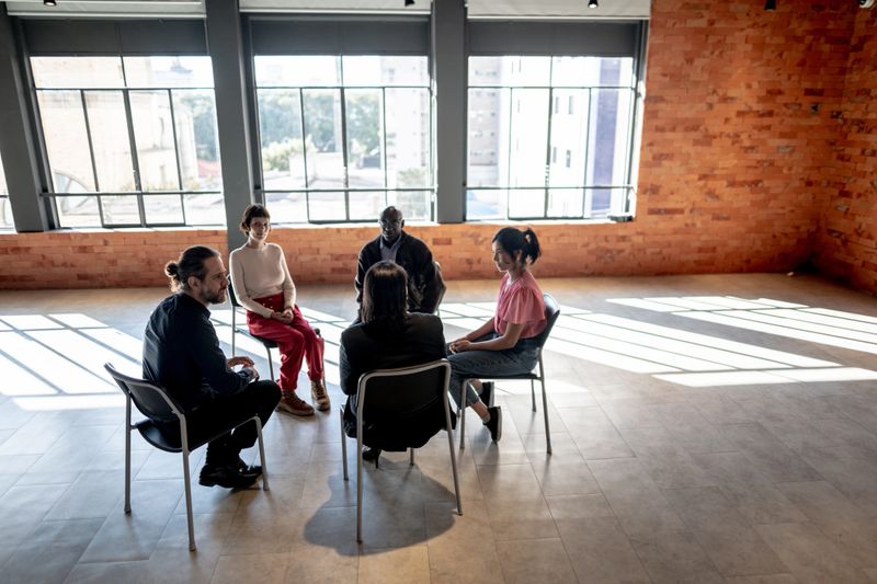 People talking during group therapy