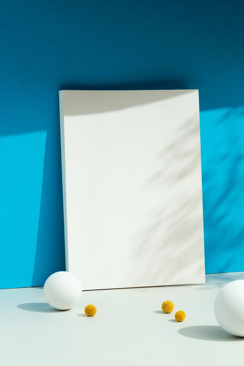 Magazine cover mockup on blue background with sharp diagonal shadow