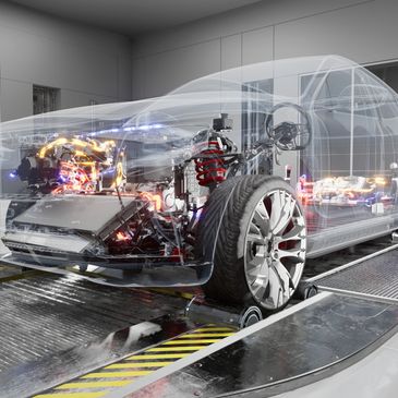 Transparent car model revealing internal electric components and suspension system.