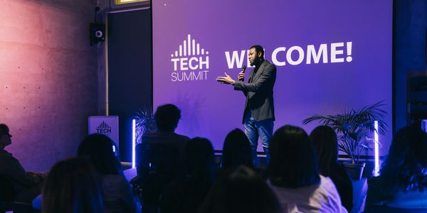 man giving speech on mic