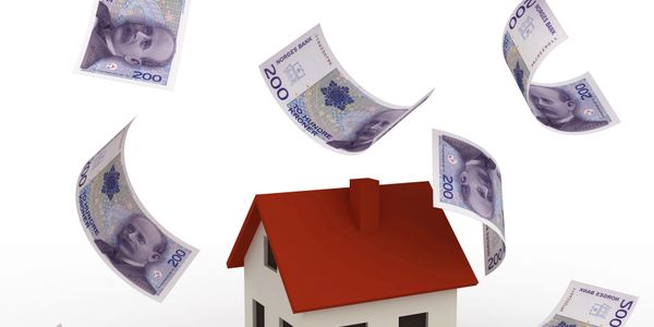 Norwegian kroner bills falling around a house model.