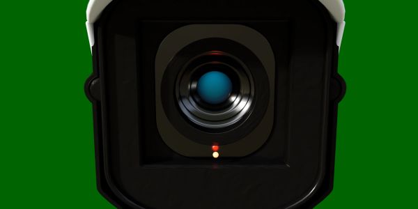 Close-up of a security camera lens.