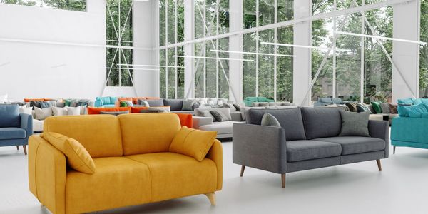 Modern sofas in a spacious showroom.