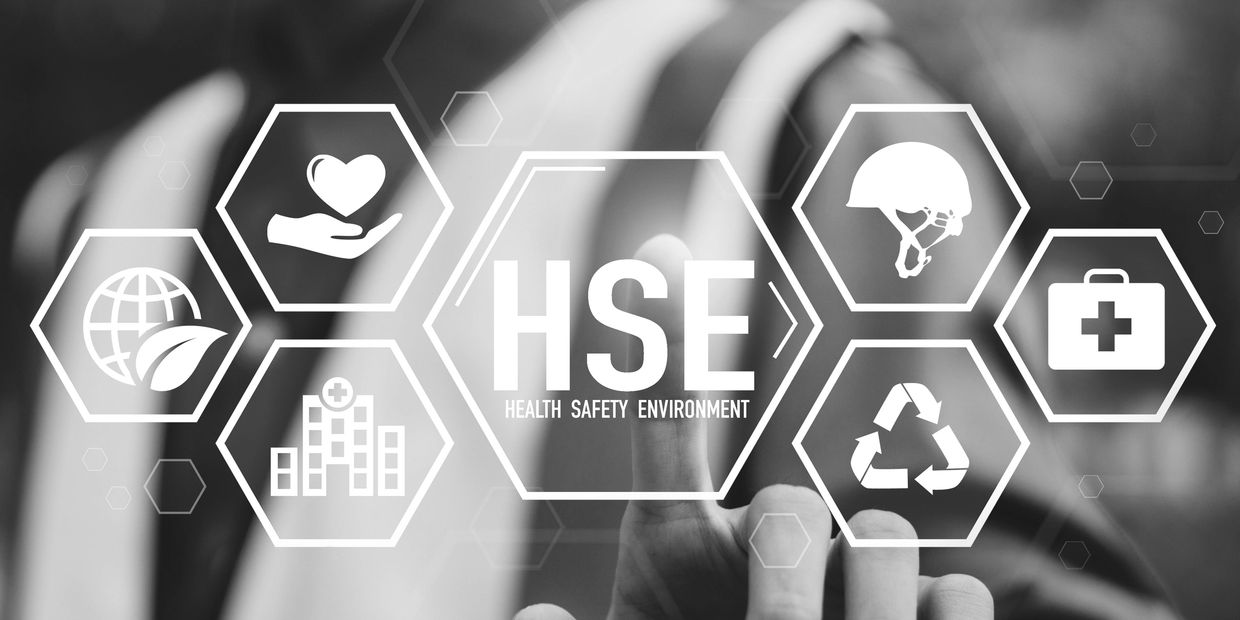 HSE icons representing health, safety, and environment with a person in safety gear.