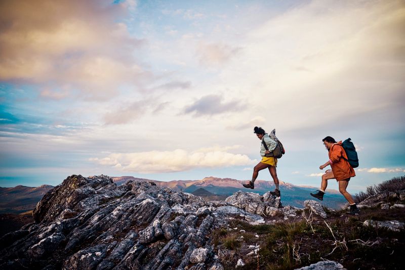 Adventurous, active women exploring the wild beauty of Tasmania, Australia.