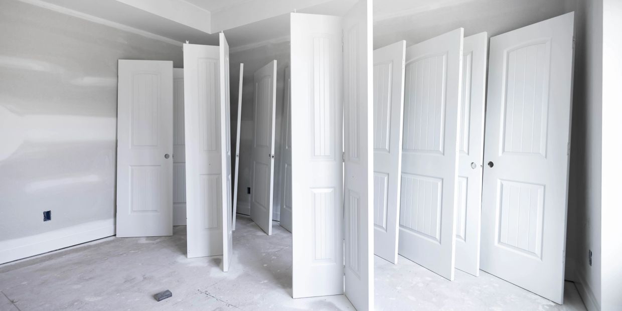Many white interior doors ready for installation