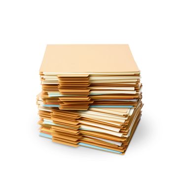 A large stack of organized manila folders isolated on white.