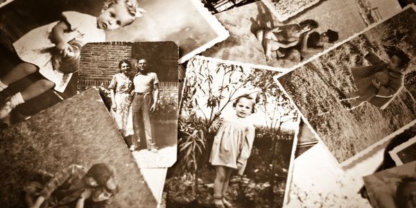 A collection of vintage sepia-toned photographs showcasing family moments and portraits.