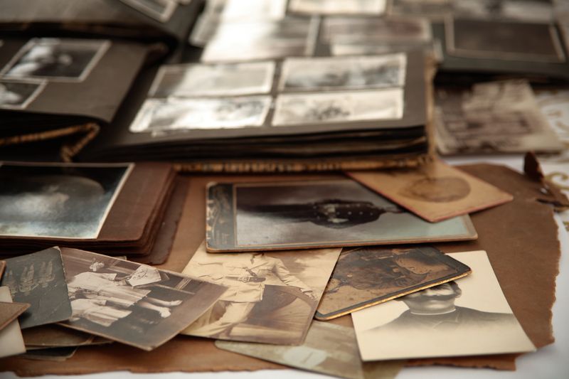 Old photos and albums in sephia on beige paper