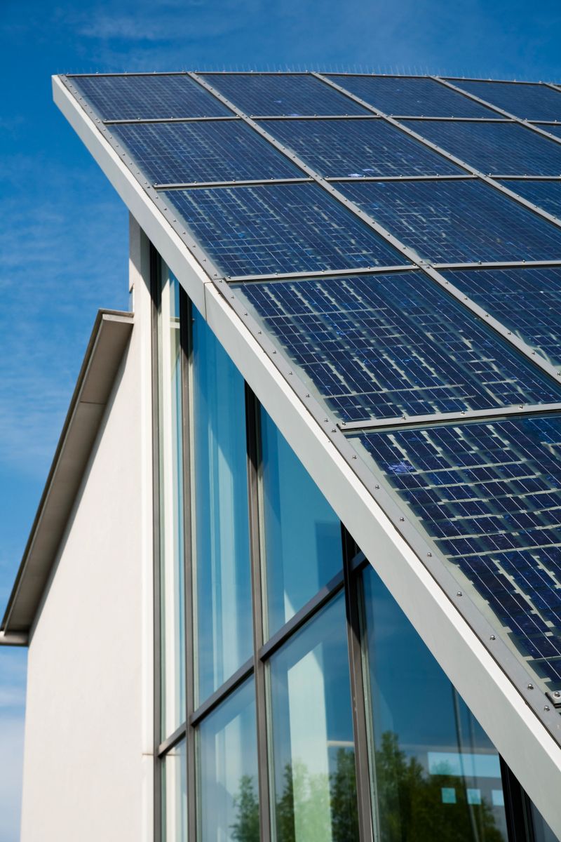 office building with solar panel roof, 