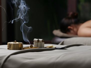 massage therapy session, massage tables, incences and calming energy