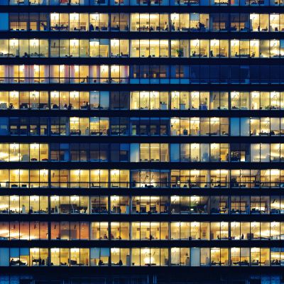 Illuminated office building at night.