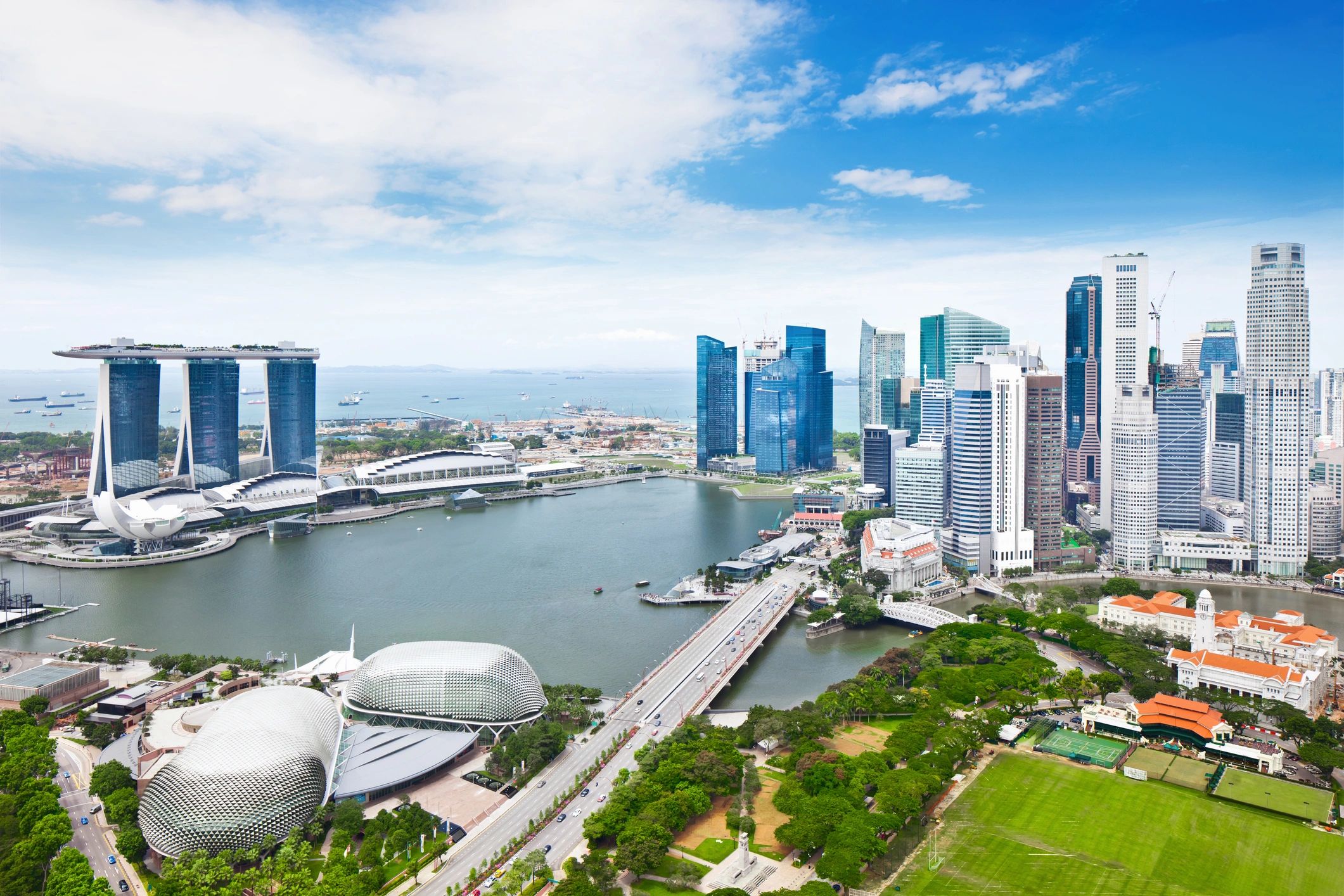 Skyline of Singapore with Marina Bay Sands and skyscrapers.