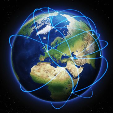 Glowing blue network lines connecting different parts of Earth in space.