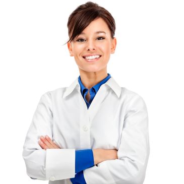 Smiling woman in white lab coat with arms crossed.