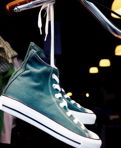 Showcasing the Rude Tymz Earth limited edition sneaker collection, featuring handcrafted leather shoes in striking purple and black designs. Perfect for urban apparel enthusiasts and ideal for retailers seeking exclusive offerings in their wholesale reseller program.