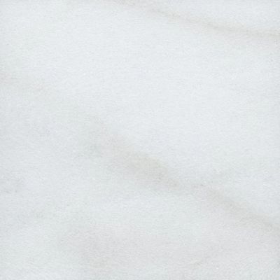 Close-up of a smooth white marble surface with subtle gray veining.