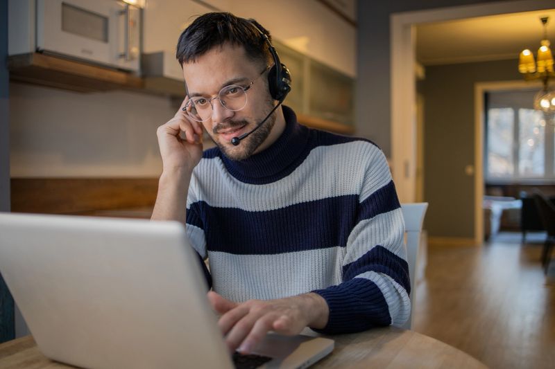 Young businessman working from home