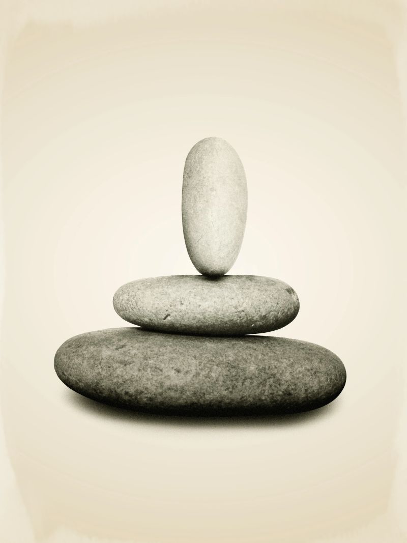 three piled stones in equilibrium