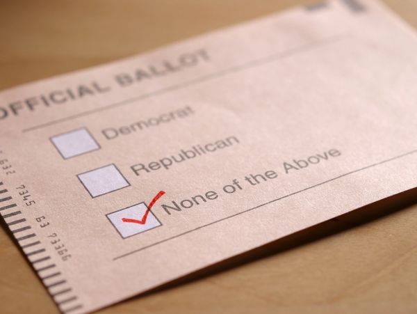 Ballot with 'None of the Above' checked.