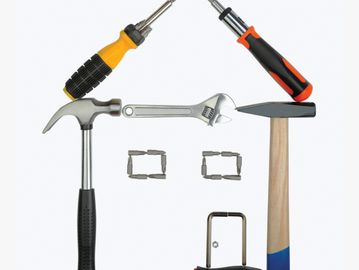 Various hand tools arranged neatly on a white background.