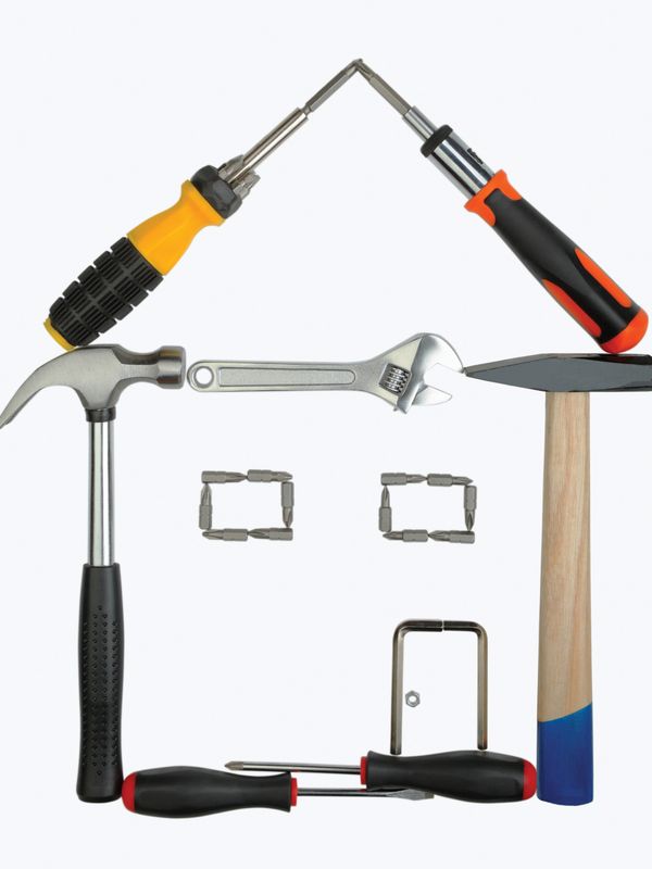 House shape made from various hand tools and bits.