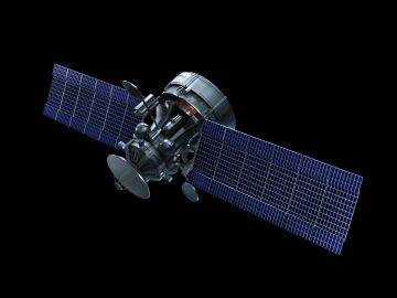 A satellite with extended solar panels floating in space.