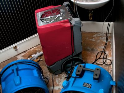 DryTex Water mitigation equipment drying a water-damaged North Texas Home