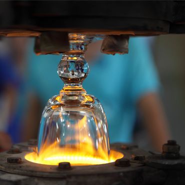A glass being blown and shaped with fire.
