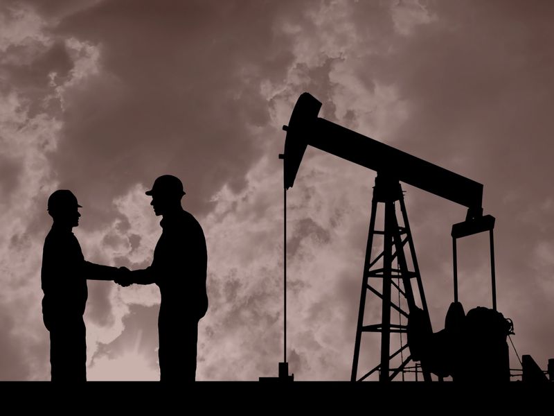 Oil Pump Pumpjack & Worker Silhouettes