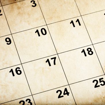 Close-up of a calendar page with dates 9 to 25.