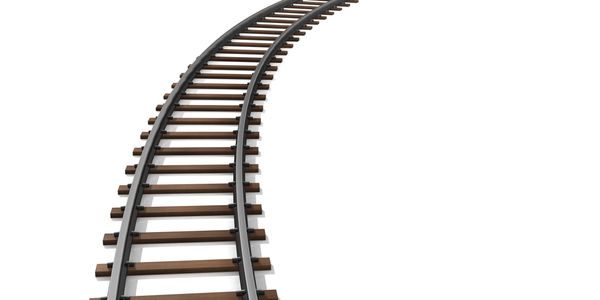 Curved railway track on a white background.