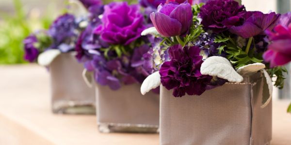 Floral arrangement in a Gresham's container.