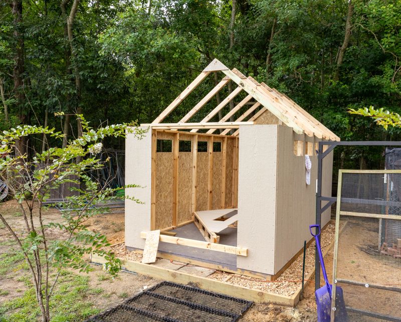 Storage shed being built in back yard