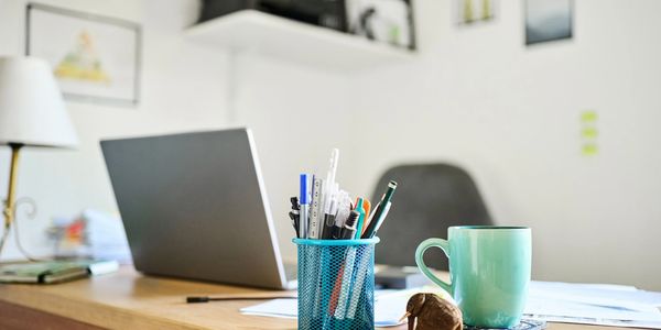 A clean creative workspace representing the T. Carlita Network’s media and design environment.