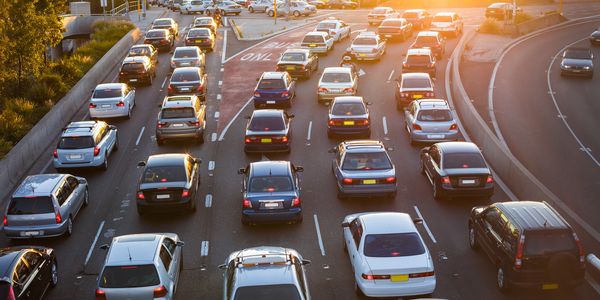 image of a traffic jam on a 5 land highway 
