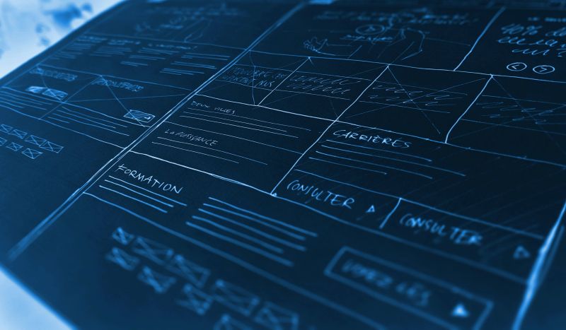 A close-up of UX design wireframes for a website