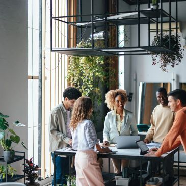 Young professionals collaborating in a modern office space.