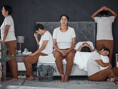 Multiple images of a woman showing various emotional distress in a bedroom.