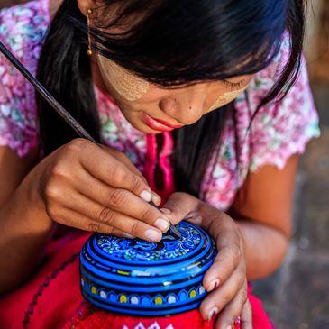  A woman writing on a box