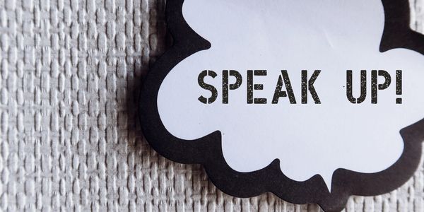 Picture of a speech bubble that says "Speak Up!"