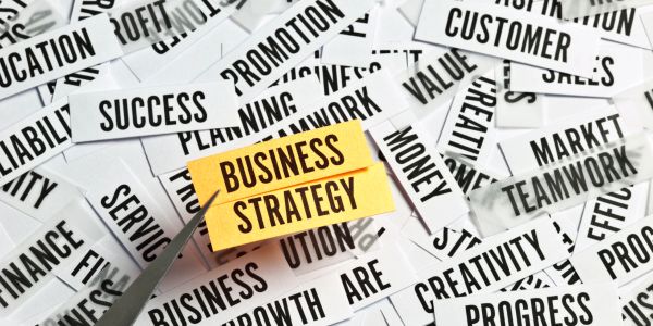 Words related to business strategy highlighted among scattered keywords.