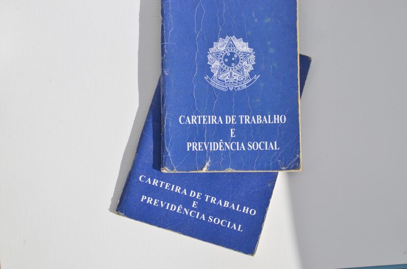 Brazil Work Card. Translation - Federative Republic of Brazil, Ministry of Labour. Brazilian work card on the table. symbolizing the importance of employment and financial stability