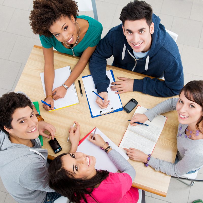 Group of Young Students Studying together at Library, High View.
