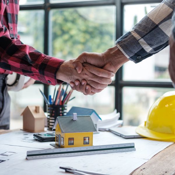 Contractor and client agreeing to the contract!