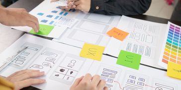 AI development team building and testing custom machine learning models with real business data