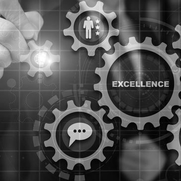 icons of gears illustrating the concept of quality improvement.  Three gears.
