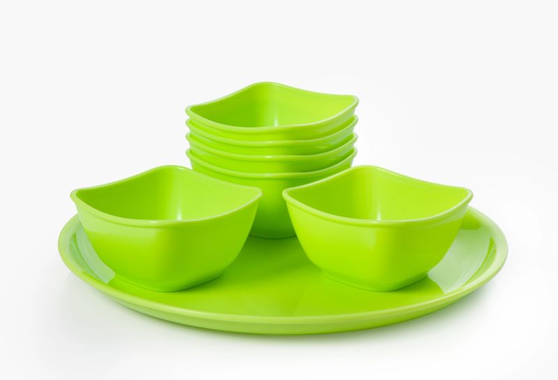 Close up of plastic  microwave bowl and plate isolated over white