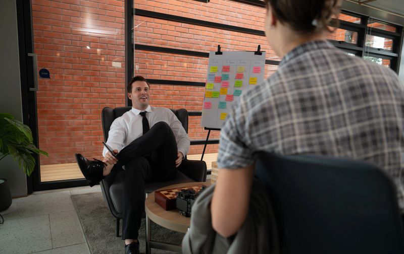 Business people working together in a modern office. Business people discussing business plan.